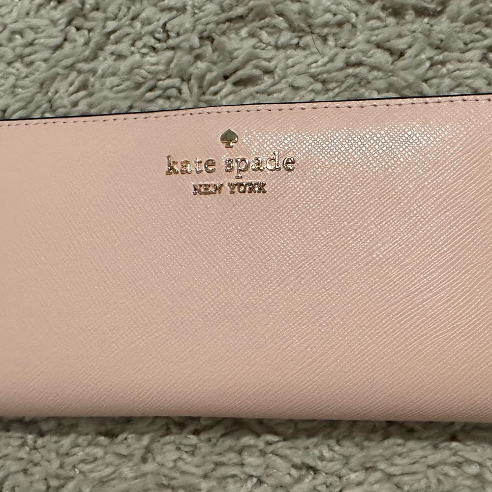 Kate Spade Madison large bifold wallet. Conch pink saffiano leather.